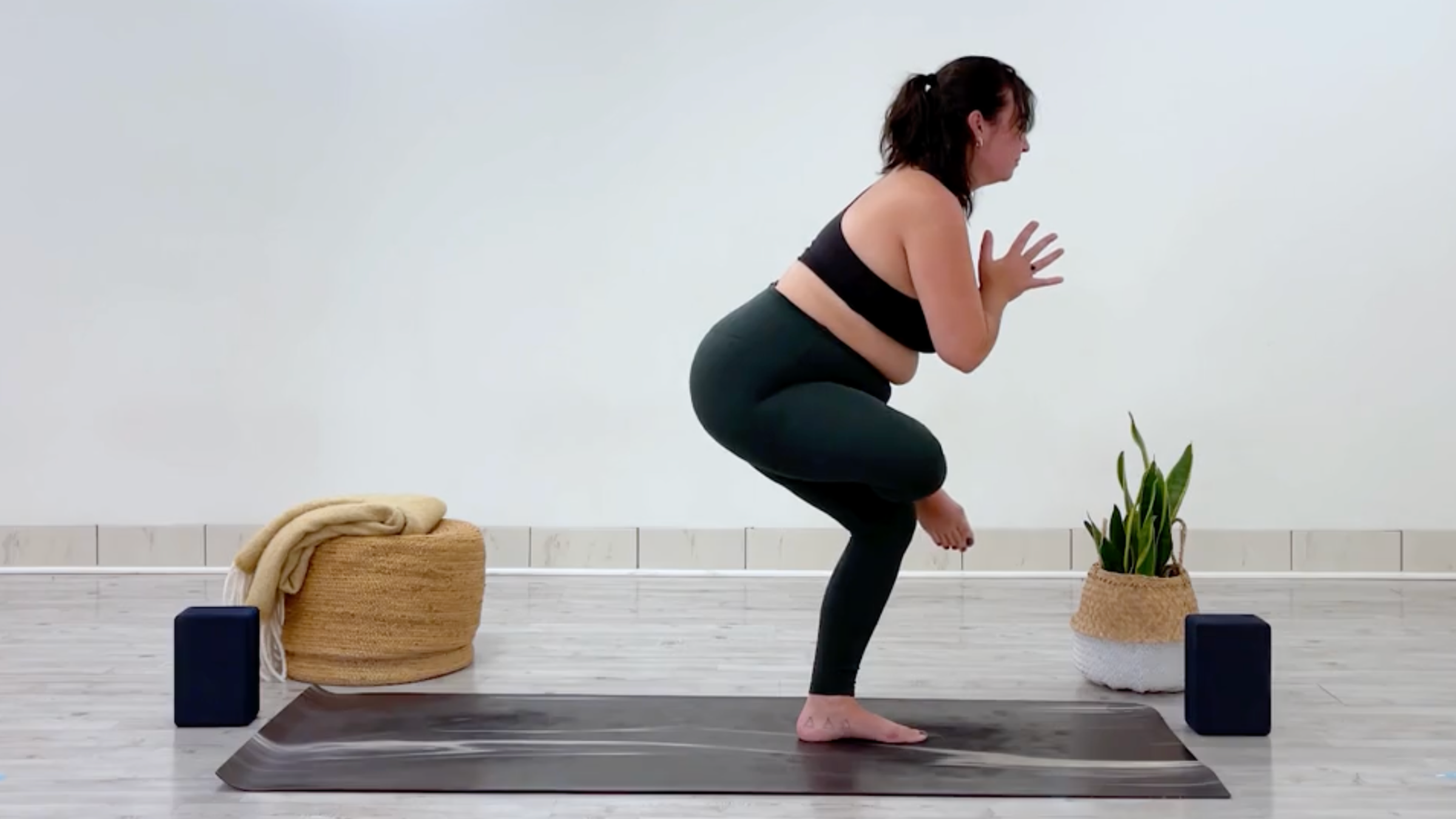 Yoga teacher Taylor Lorenz in Standing Figure-4, part of her yoga for balance practice